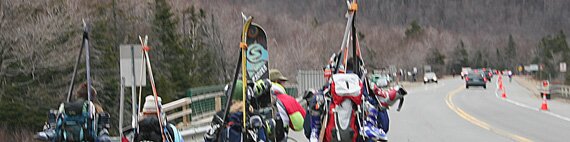 Skiers on route 16 in Pinkham Notch